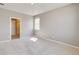 Spacious bedroom with carpet flooring and access to bathroom at 18359 Field Mint Pt, Parker, CO 80134