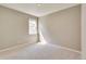Bright bedroom with carpet and a large window at 18359 Field Mint Pt, Parker, CO 80134