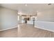 Open concept dining area with kitchen and breakfast bar visible at 18359 Field Mint Pt, Parker, CO 80134