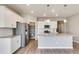 Modern kitchen with stainless steel appliances and an island at 18359 Field Mint Pt, Parker, CO 80134