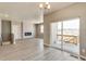Spacious living room with fireplace and access to deck at 18359 Field Mint Pt, Parker, CO 80134