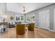 Inviting living room featuring hardwood floors, large windows, and modern decor at 3820 S Grant St, Englewood, CO 80113