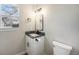 Clean bathroom with modern vanity and fixtures at 909 Reynolds Farm Ln # C2, Longmont, CO 80503