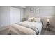 Stylishly decorated bedroom with a soft headboard, closet and charming side table creates a peaceful retreat at 909 Reynolds Farm Ln # C2, Longmont, CO 80503
