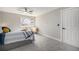 Bedroom with carpet, ceiling fan, and natural light at 909 Reynolds Farm Ln # C2, Longmont, CO 80503