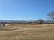Beautiful view of a golf course and mountain range at 909 Reynolds Farm Ln # C2, Longmont, CO 80503