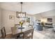 Open floor plan from dining area to living room with fireplace at 909 Reynolds Farm Ln # C2, Longmont, CO 80503