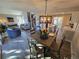 Spacious open-concept living space with dining area, kitchen, and comfortable seating at 909 Reynolds Farm Ln # C2, Longmont, CO 80503