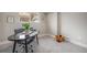 Well-lit office features neutral colors, a modern desk, and plush carpeting creating a comfortable workspace at 909 Reynolds Farm Ln # C2, Longmont, CO 80503