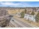 Townhomes with mountain views, showcasing nearby golf course, and an open landscape at 909 Reynolds Farm Ln # C2, Longmont, CO 80503