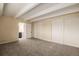 Spacious bedroom with ample closet space and an en-suite bathroom at 1180 Yosemite St # 104, Denver, CO 80220