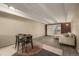 Cozy dining area with a table and chairs near the kitchen at 1180 Yosemite St # 104, Denver, CO 80220