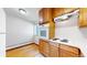 Clean kitchen featuring wood cabinets and an electric stove at 1056 N Marion St # 204, Denver, CO 80218