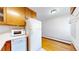 Updated kitchen, featuring wood cabinets and dishwasher at 1056 N Marion St # 204, Denver, CO 80218