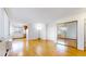 Bright living room with hardwood floors and open concept kitchen at 1056 N Marion St # 204, Denver, CO 80218