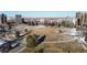 Aerial view of park near city skyline in winter at 1056 N Marion St # 204, Denver, CO 80218