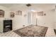 Finished basement room with shelving and a large patterned rug at 3751 W 85Th Ave, Westminster, CO 80031