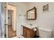 Small bathroom featuring a wooden vanity and medicine cabinet at 3751 W 85Th Ave, Westminster, CO 80031