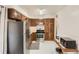 Traditional style kitchen featuring wooden cabinets, stainless steel appliances, and light tile floors at 3751 W 85Th Ave, Westminster, CO 80031