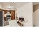 Bright kitchen with stainless steel appliances and dark cabinets at 3751 W 85Th Ave, Westminster, CO 80031