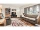 Comfortable living room features ample seating and plenty of natural light at 3751 W 85Th Ave, Westminster, CO 80031