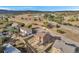 Aerial view of a home with a fenced in back yard in a neighborhood setting at 861 Circle Rd, Palmer Lake, CO 80133