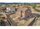 Aerial view of a home with a fenced in back yard in a neighborhood setting at 861 Circle Rd, Palmer Lake, CO 80133