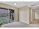 Carpeted basement space with a sliding glass door and access to the backyard at 861 Circle Rd, Palmer Lake, CO 80133