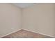 A bright bedroom features neutral-colored walls and carpet at 861 Circle Rd, Palmer Lake, CO 80133
