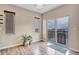Dining area with a sliding glass door to the deck and wood-look floors at 861 Circle Rd, Palmer Lake, CO 80133