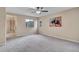Spacious main bedroom with ensuite bathroom and carpeted floors at 861 Circle Rd, Palmer Lake, CO 80133