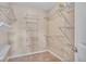 Walk-in closet with plenty of storage space via wire shelving at 861 Circle Rd, Palmer Lake, CO 80133