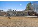 This backyard patio has an outdoor dining set and furniture ideal for entertainment and enjoying outdoor scenery at 7110 S Cherry Dr, Centennial, CO 80122