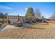 The backyard patio is perfect for entertaining with an outdoor dining set and furniture at 7110 S Cherry Dr, Centennial, CO 80122