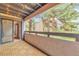 The covered balcony with outdoor lights provides serene outdoor living space at 6410 S Dayton St # I05, Englewood, CO 80111