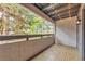 Private balcony with a wood-patterned floor offers a relaxing outdoor space at 6410 S Dayton St # I05, Englewood, CO 80111