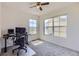 Versatile home office with carpet flooring, bright windows, and ceiling fan at 3752 Red Deer Trl, Broomfield, CO 80020