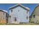 Charming two-story home featuring light blue siding, a well-maintained yard, and a private back patio at 3752 Red Deer Trl, Broomfield, CO 80020