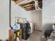 Functional laundry area with modern washer, dryer, storage, and convenient utility connections at 3752 Red Deer Trl, Broomfield, CO 80020