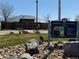 Broomfield County Commons Park sign featuring a map and reservation contact information, surrounded by rocks and greenery at 3752 Red Deer Trl, Broomfield, CO 80020