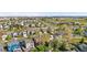 Aerial view of community with playground, green space, and residential homes at 5997 S Yakima St, Aurora, CO 80015