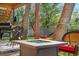 Inviting backyard with a fire pit, outdoor seating, hammock, and Traeger grill at 5997 S Yakima St, Aurora, CO 80015