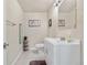 Powder room featuring white vanity and tile floors with a modern sink faucet at 5997 S Yakima St, Aurora, CO 80015