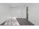 Neutral bedroom features double closets, window, and carpeted floor at 5997 S Yakima St, Aurora, CO 80015