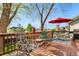 Cozy deck furnished with comfortable seating, a small table, and a grill at 5997 S Yakima St, Aurora, CO 80015
