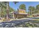 Rustic-style commercial building with porch and signage at 39460 Congress Ln, Elizabeth, CO 80107