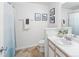 Clean bathroom with a shower-tub combo, modern fixtures, and a stylish mirror at 7422 S Quail Cir # 1624, Littleton, CO 80127