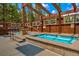 Outdoor hot tub area featuring multiple hot tubs and wood frame offering a relaxing spa experience at 200 Primrose Path # 11, Breckenridge, CO 80424