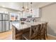 Charming kitchen boasts granite countertops, a mosaic backsplash, and stainless steel appliances at 200 Primrose Path # 11, Breckenridge, CO 80424