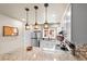 Updated kitchen showcasing granite countertops, modern appliances, and ample cabinet space at 200 Primrose Path # 11, Breckenridge, CO 80424